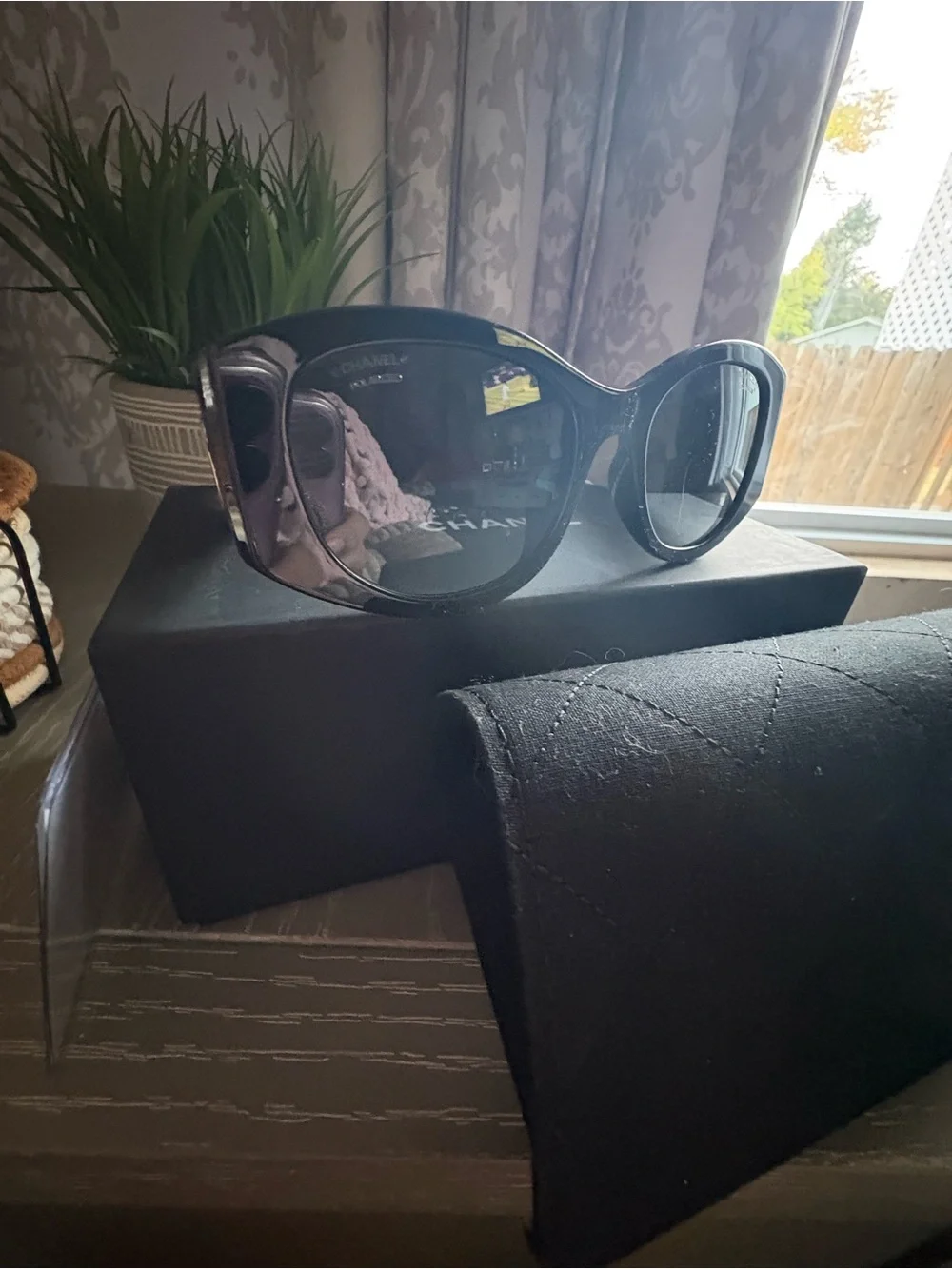 CHANEL Oval Polarized Black Sunglasses with Beige Inner Accents